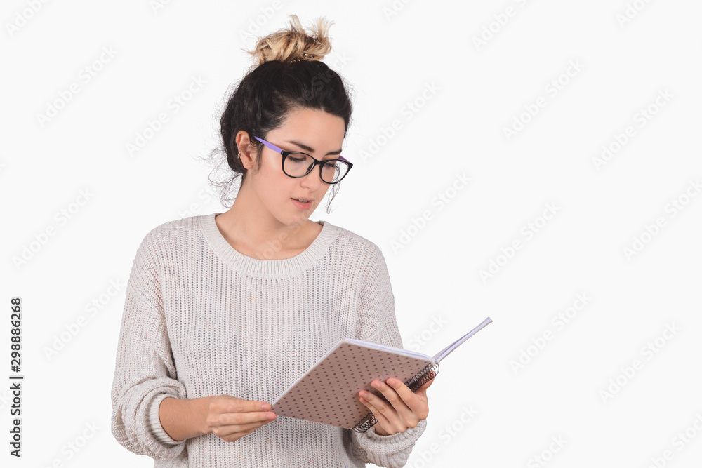 young woman reading a book on studio young woman reading a book on studio