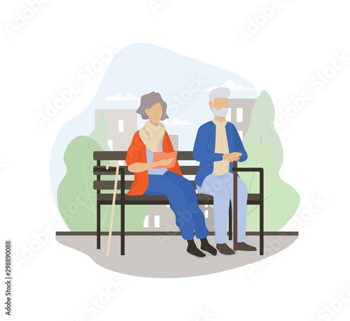 Old couple sitting on the bench together. Senior man and woman in the park.