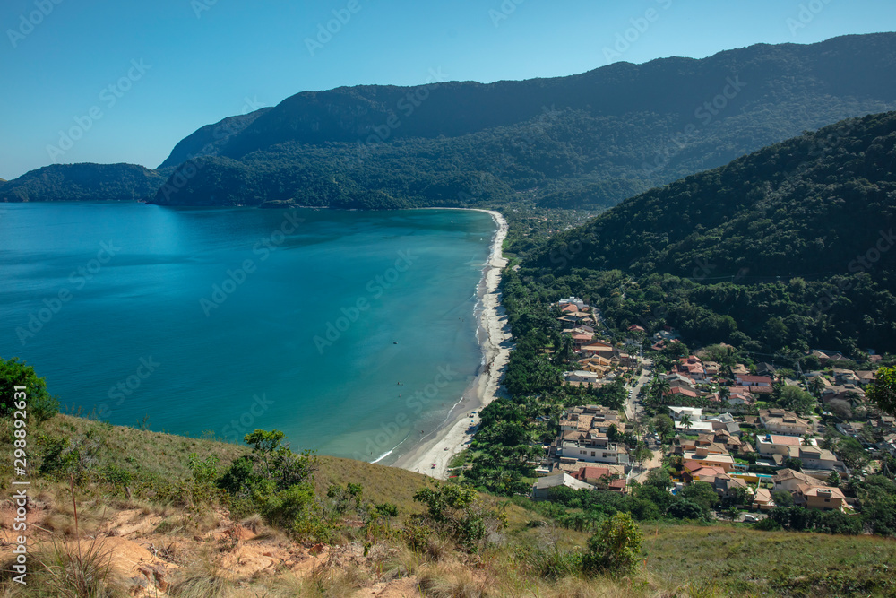 Beautiful panoramic view of Ilhabela island, tropical island on the Brazilian sea coast during a sunny day of vacation and sightseeing.