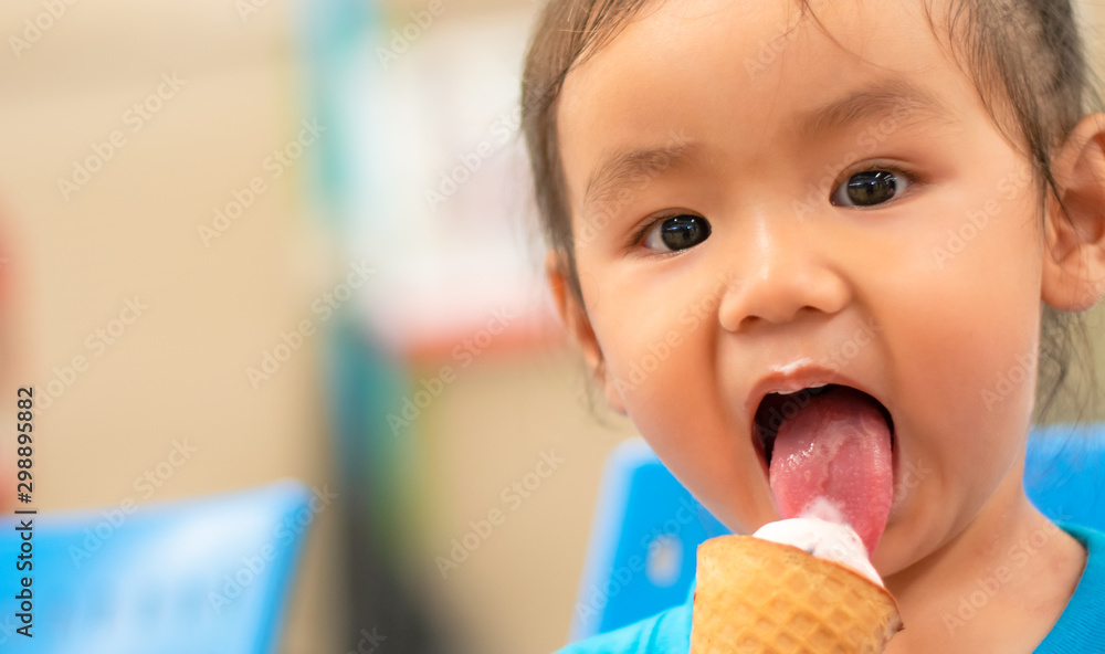Kindergarten Asian girls eating ice cream Kindergarten Asian girls eating ice cream