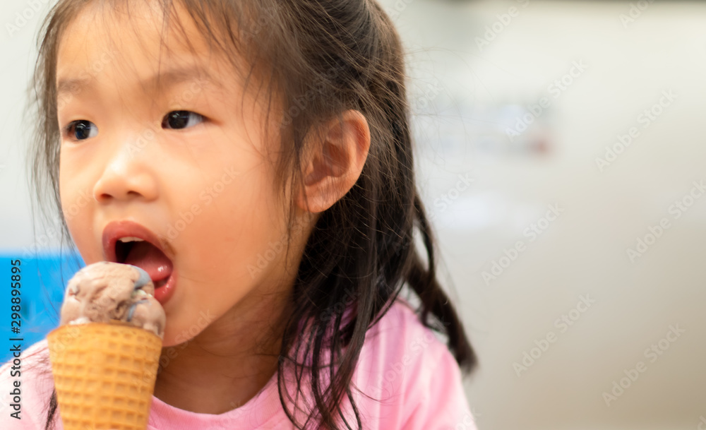 Kindergarten Asian girls eating ice cream Kindergarten Asian girls eating ice cream