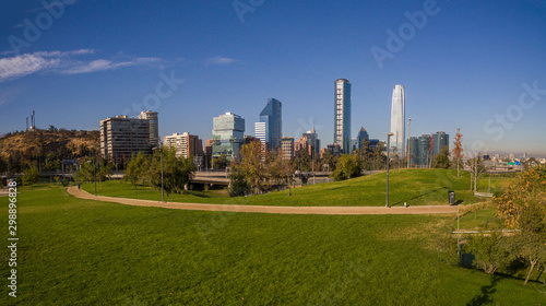 Aerial view of road jungtion and Manquehue hill from Vitacura bicentennial park on a clear day in Chilean capital Santiago © lblinova