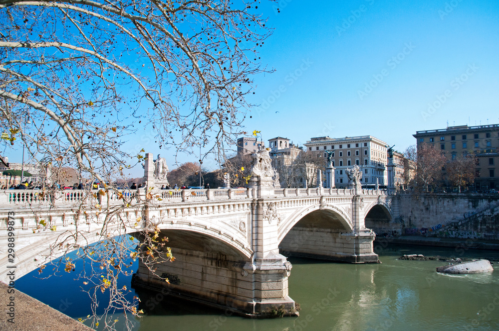 Fototapeta premium Ponte Sant'Angelo built in 134 AD by Roman Emperor Hadrian to span the Tiber from the city center to his mausoleum, Rome, Italy.