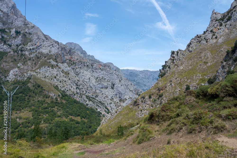 Source Route in the peaks of Europe with cliffs and sunny day