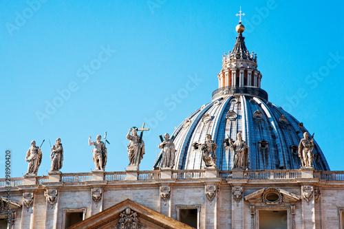 Dome and statues on top of St. Peter's Basilica in the Vatican, Rome. Christ at the centre, with John on left and Andrew on the right.