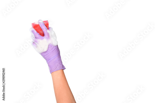 Sponge washing dishes in female hand. Hand in a latex glove isolated on white. Woman's hand gesture or sign isolated on white. A hand in a glove holds a sponge for washing and cleaning dishes