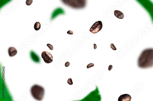 Grains of coffee and leafs levitation