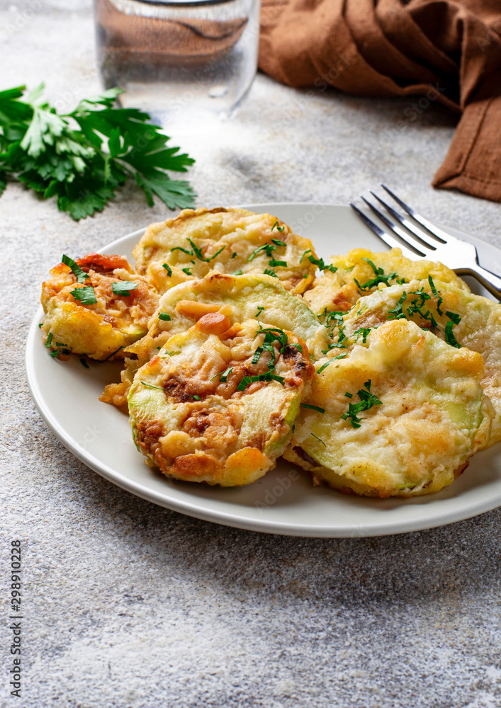 Fried zucchini slices with parsley Fried zucchini slices with parsley