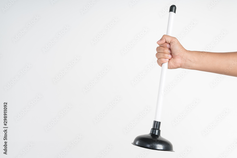 Hand holding toilet black rubber plunger or toilet suction cup Hand holding toilet black rubber plunger or toilet suction cup