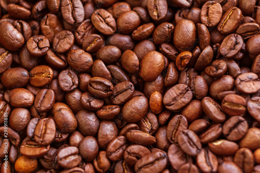 Roasted aromatic brown coffee beans background Roasted aromatic brown coffee beans background