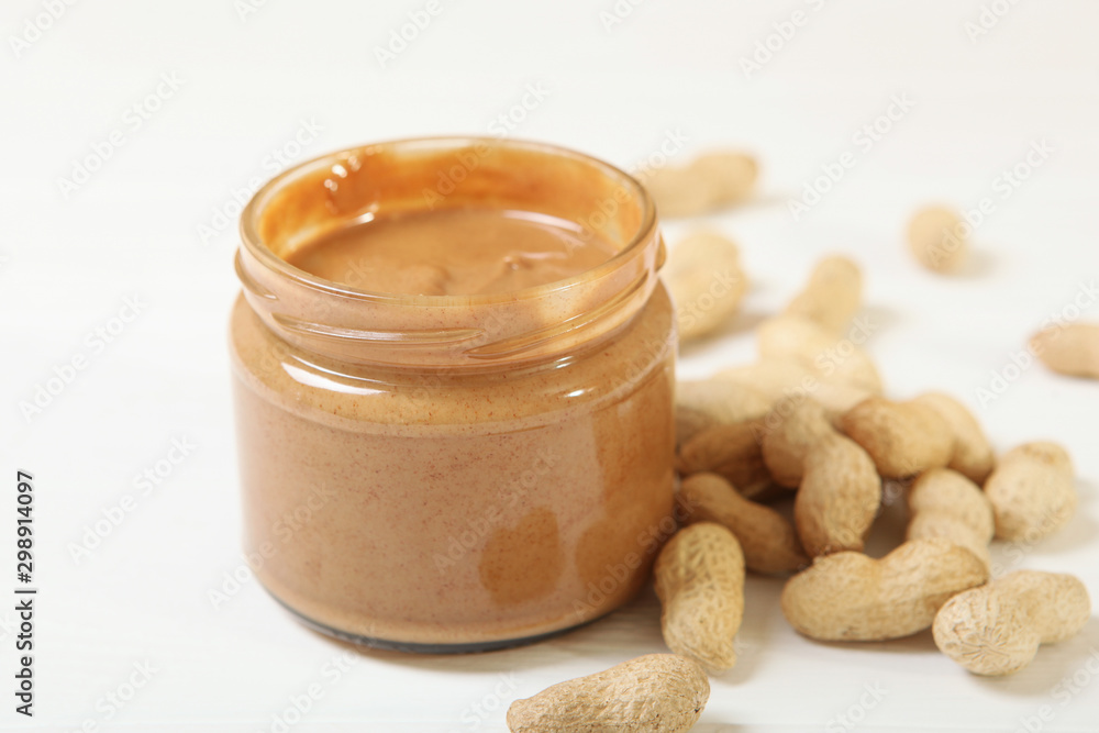 creamy peanut butter on the table. Peanut paste. creamy peanut butter on the table. Peanut paste.