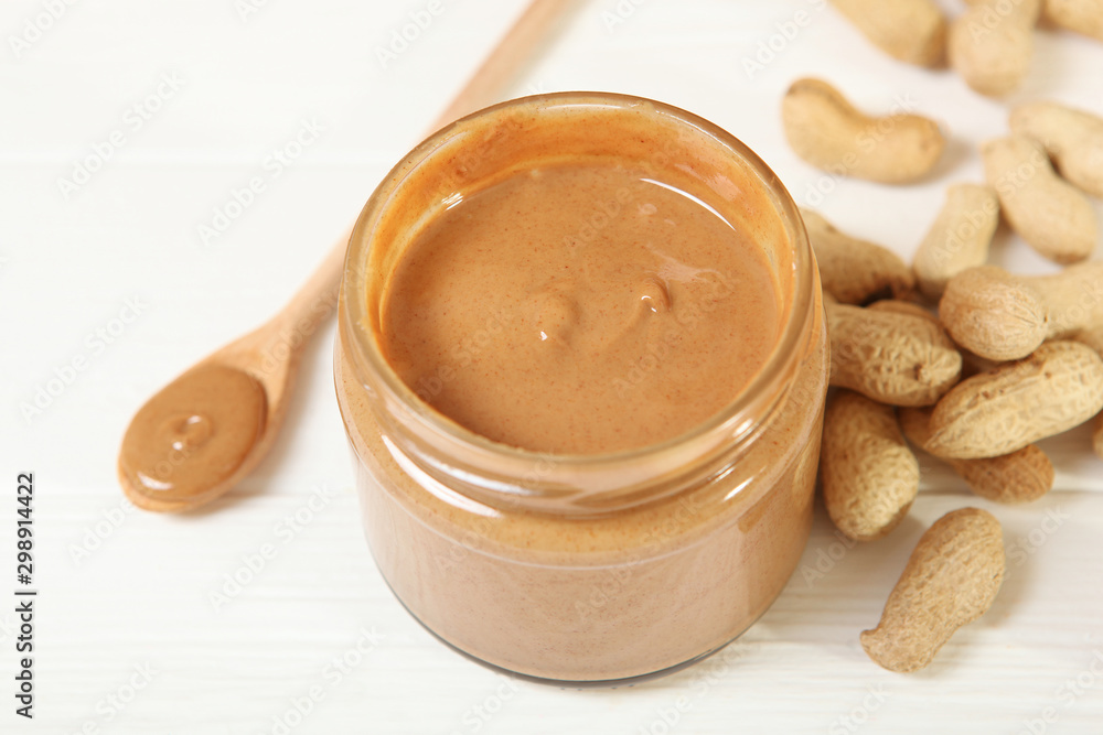 creamy peanut butter on the table. Peanut paste. creamy peanut butter on the table. Peanut paste.