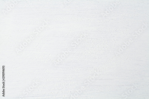The structure of a white wood panel as a background.