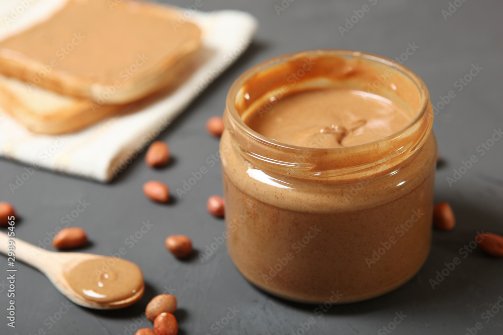 creamy peanut butter on the table. Peanut paste. creamy peanut butter on the table. Peanut paste.