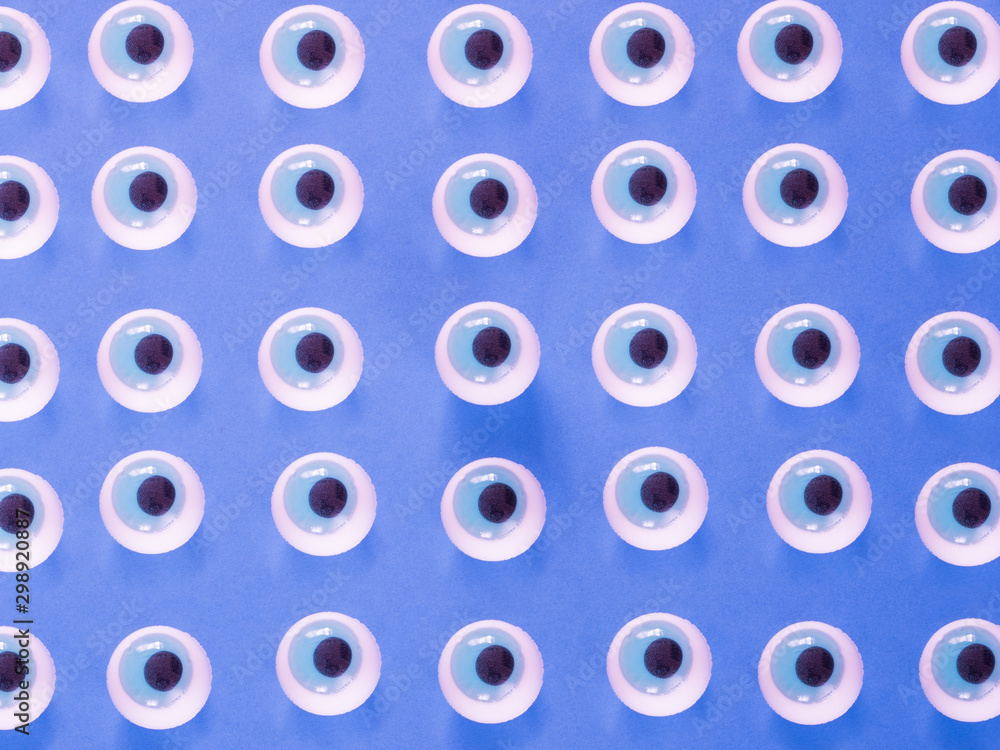 Eyes pattern on blue background Eyes pattern on blue background