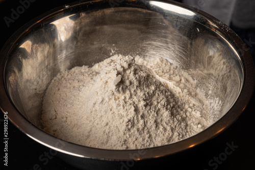 Flour in a metal bowl