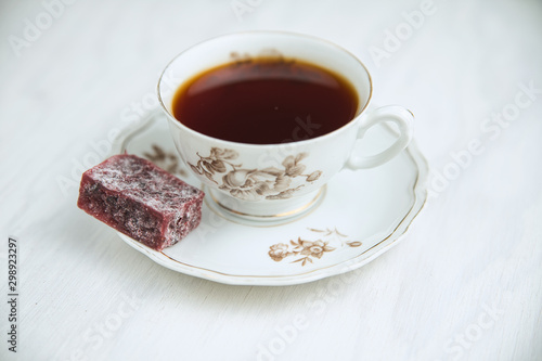 White porcelain tea cup on a white background