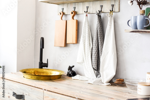  kitchen interior, sink kitchen towels and dishes in the interior