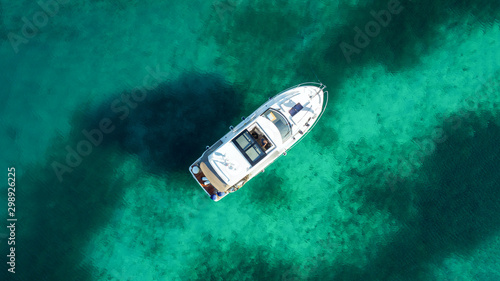 Pleasure Speedboat sailing on blue clear water in the Adriatic sea. Aerial view