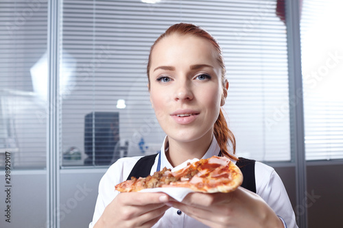 businesswomen with pizza