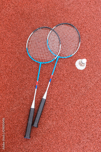 badminton rackets on court