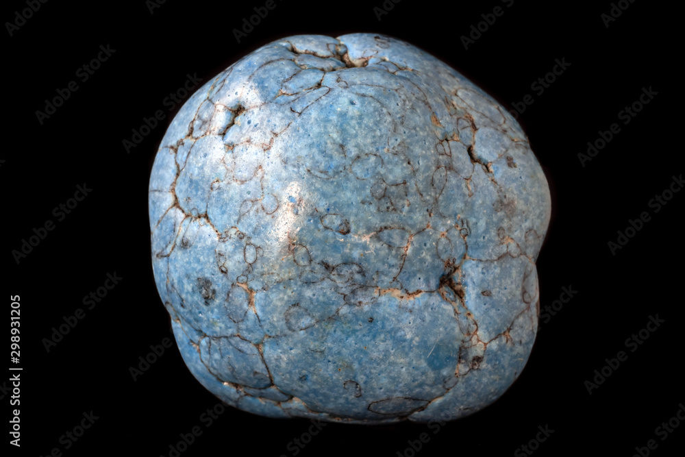 Turquoise mineral from South Africa isolated on a pure black background. Turquoise mineral from South Africa isolated on a pure black background.