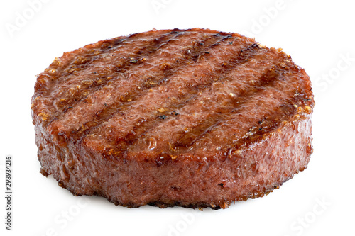 Plant based grilled burger patty with grill marks isolated on white.