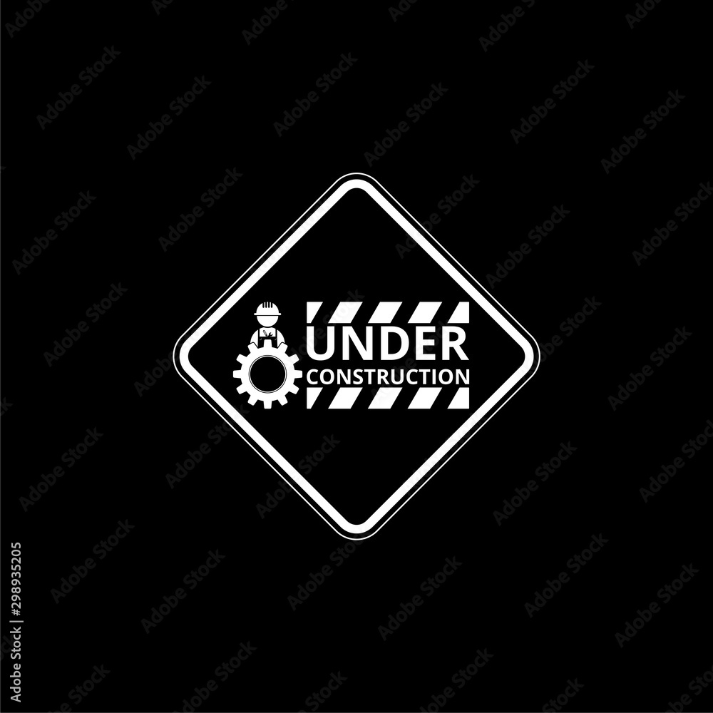Under construction sign isolated on black background Under construction sign isolated on black background