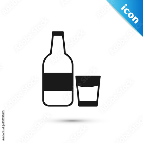 Black Closed glass bottle with milk and glass icon isolated on white background. Vector Illustration