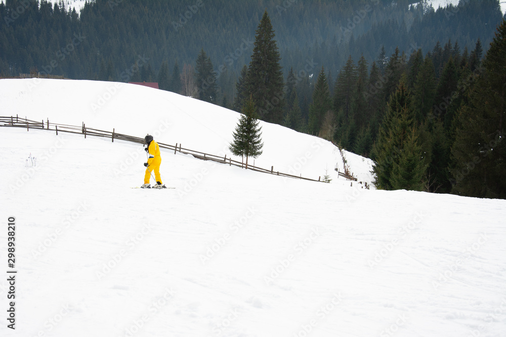 Skiers rest in the Ukrainian Carpathian village in winter. Skiers rest in the Ukrainian Carpathian village in winter.