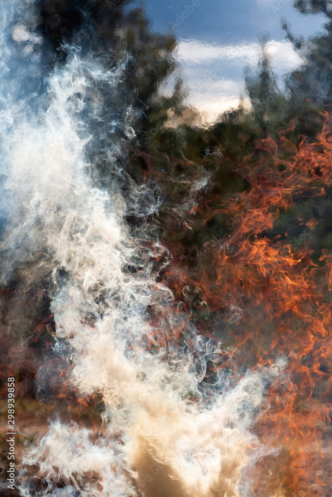 Raging fire, flames and smoke, fire background