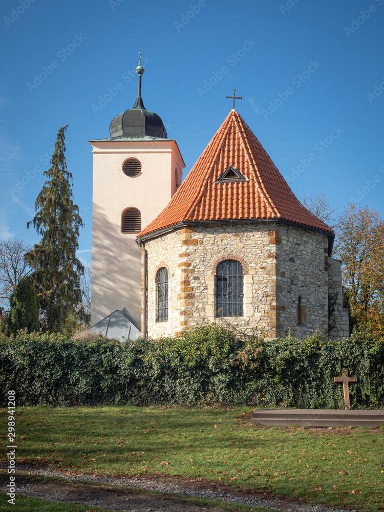 View of the christian church of St. Clement in the historic settlement of Levy Hradec, Czech Republic