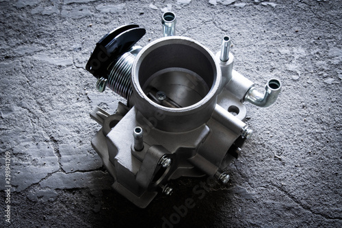 new car throttle valve on white background