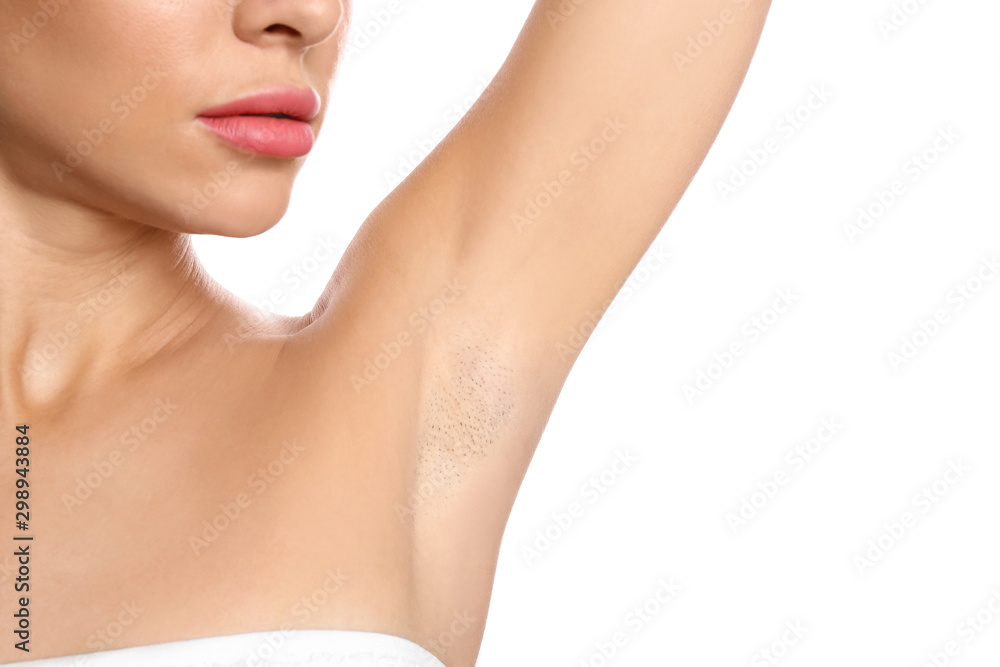 Young woman showing hairy armpit on white background, closeup. Epilation procedure