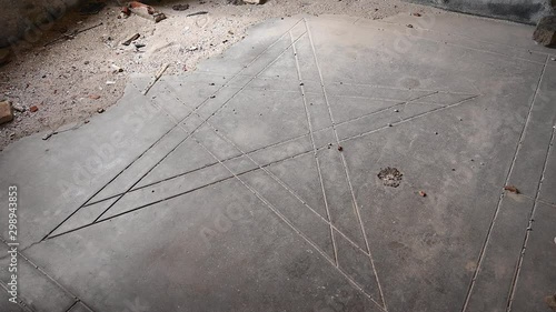 ancient pentalpha star symbol engraved in the floor of an old abandoned house, who knows for what purpose