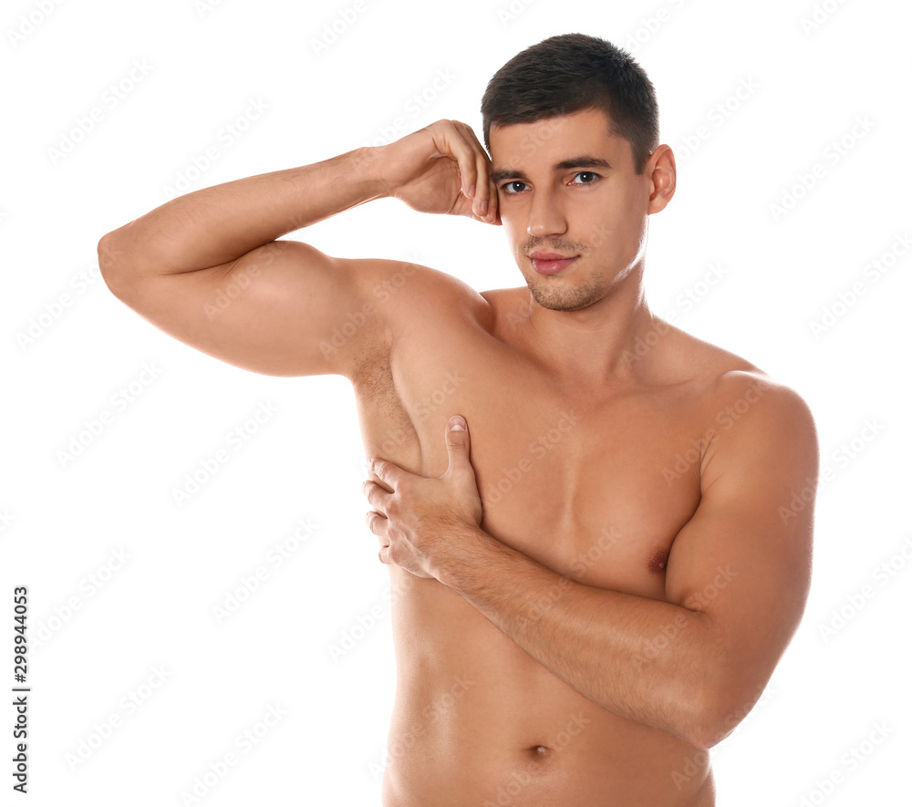 Handsome man showing hairy armpit on white background. Epilation procedure