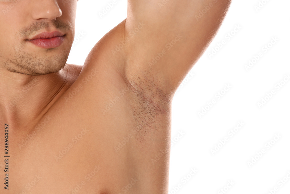 Young man showing hairy armpit on white background, closeup. Epilation procedure Young man showing hairy armpit on white background, closeup. Epilation procedure