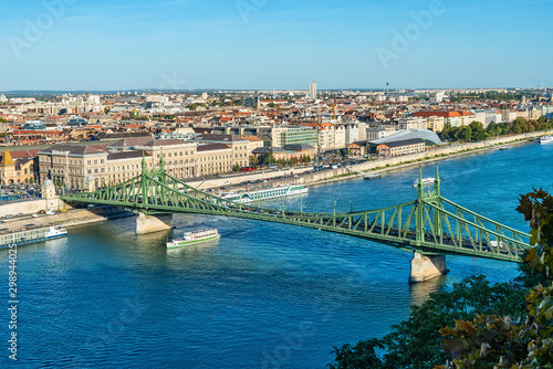 Budapest, Hungary - October 01, 2019: View of the Liberty bridge and the river Danube with Gellért Hill (Hungarian: Gellért-hegy). © nedomacki