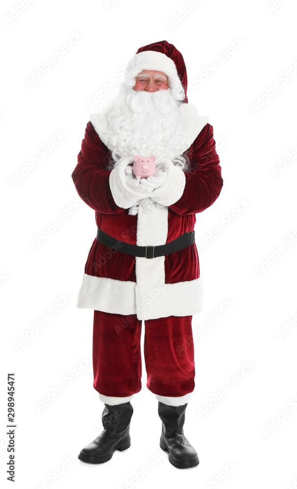 Santa Claus holding piggy bank on white background Santa Claus holding piggy bank on white background
