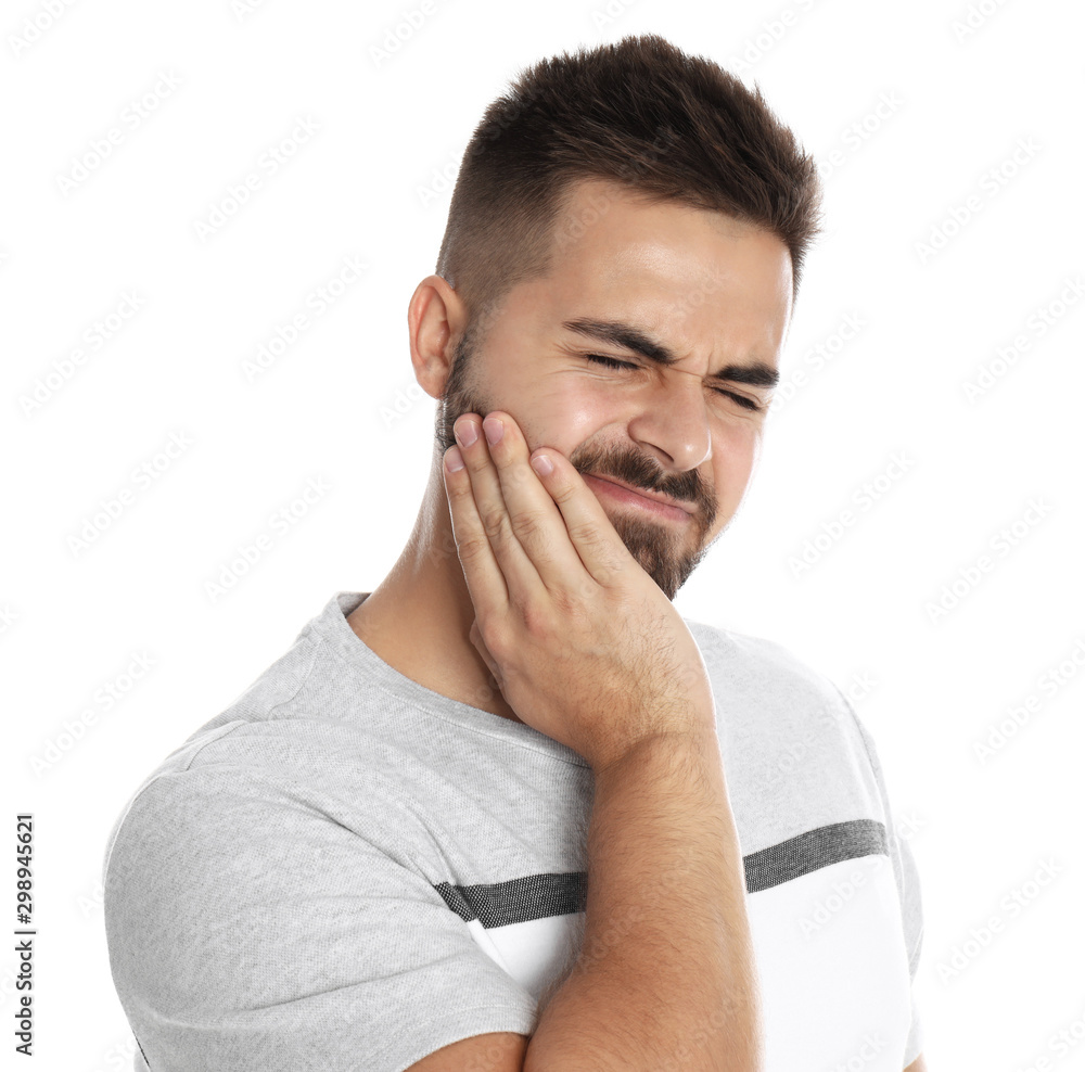 Man suffering from acute toothache on white background Man suffering from acute toothache on white background