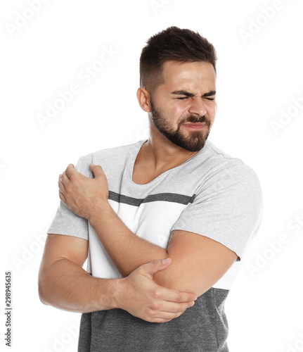 Man suffering from elbow pain on white background