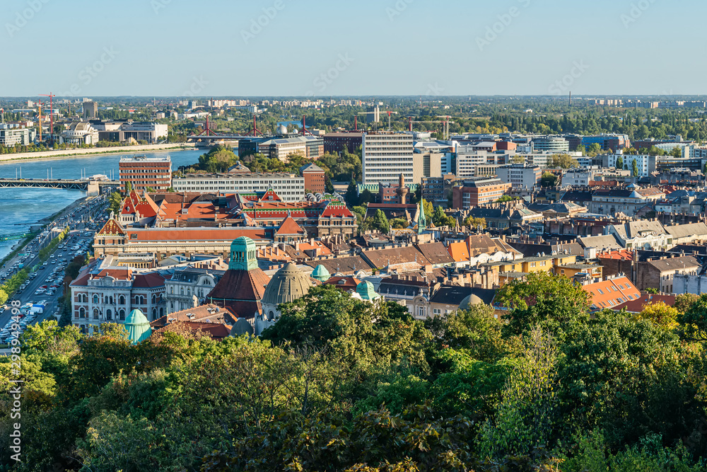 Budapest, Hungary - October 01, 2019: Panoramic cityscape view of hungarian capital city of Budapest (District XI) from the Gellert Hill.