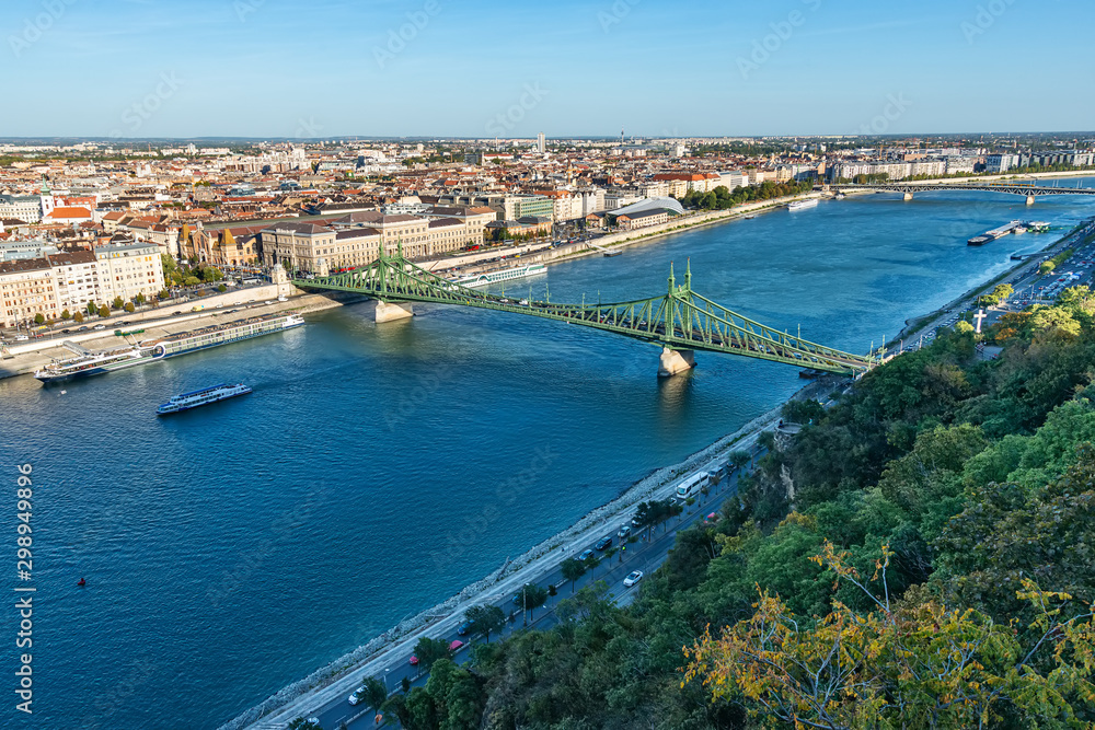 Budapest, Hungary - October 01, 2019: View of the Liberty bridge and the river Danube with Gellért Hill (Hungarian: Gellért-hegy).