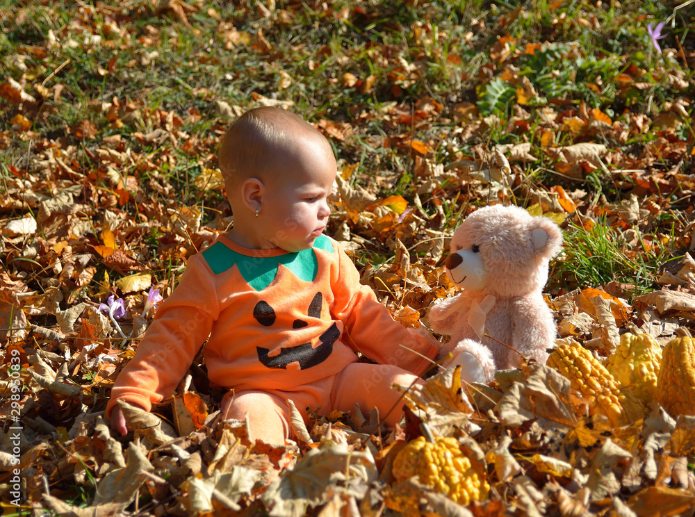 little baby girl in autumn park on sunny warm october little baby girl in autumn park on sunny warm october