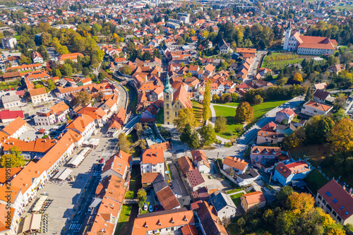 Croatia, aerial view of town of Samobor, main square, church tower and red roofs fron drone