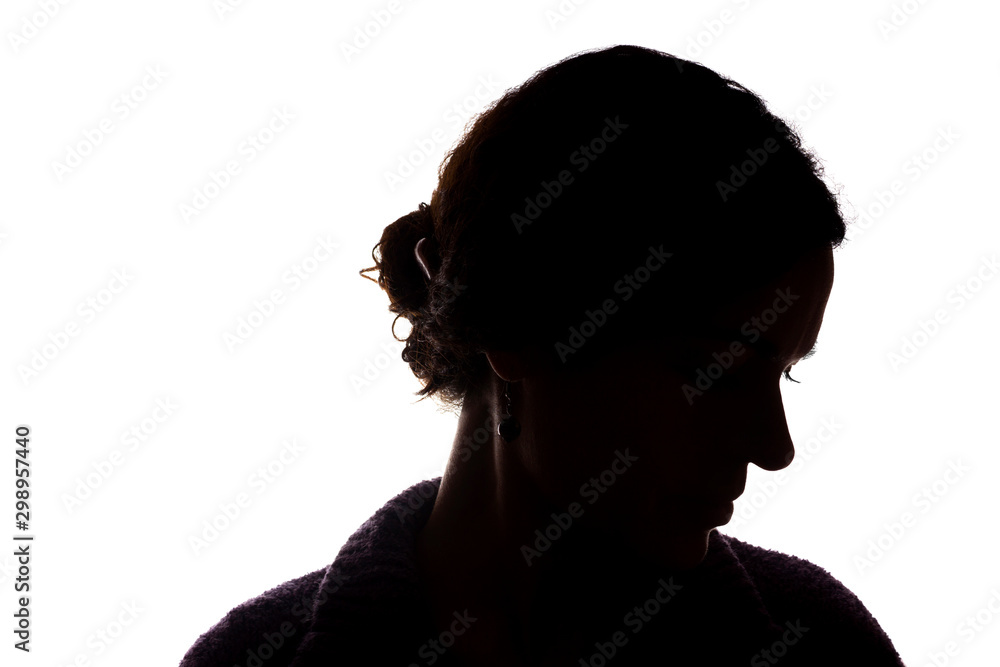 Young woman look ahead with flowing hair - silhouette