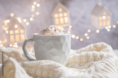 Gingerbread cookie man with a hot chocolate for Christmas holiday photo