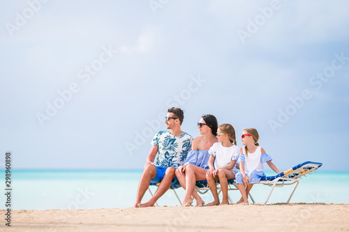 Happy family on the beach during summer vacation © travnikovstudio