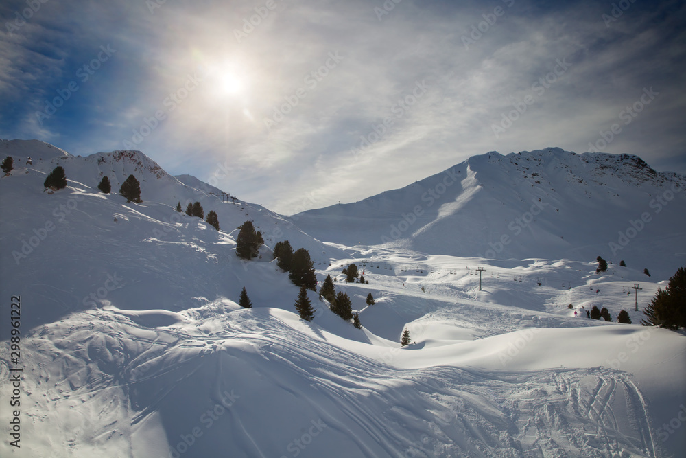 Mountain ski resort in winter sunny day, France