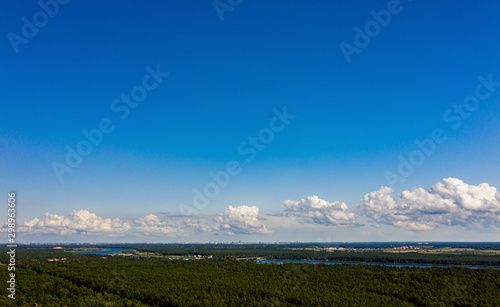Beautiful landscape. Latvian nature. Forest and river. View from above.